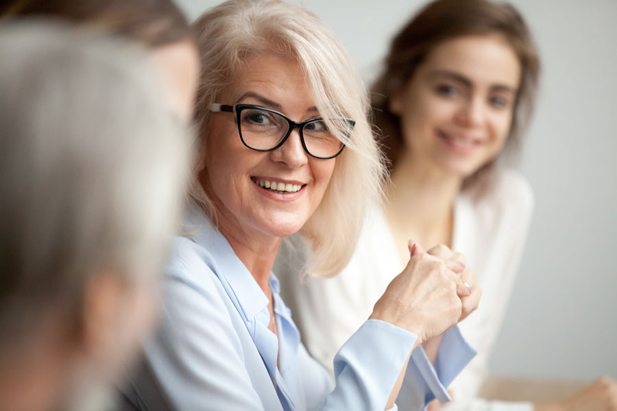 Business-Woman-50s-in-meeting--iStock-924520284